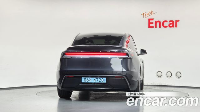Tesla Model Y 2025 — photo 4