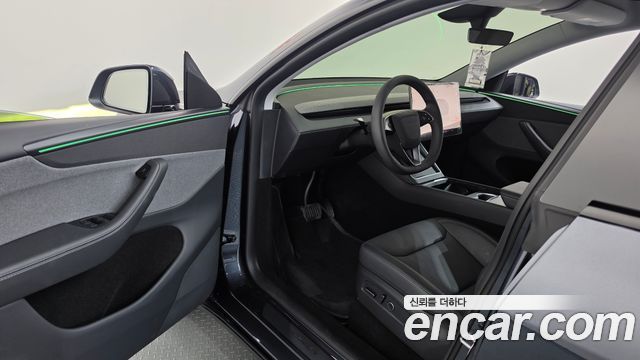 Tesla Model Y 2025 — photo 13