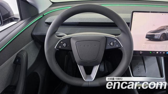 Tesla Model Y 2025 — photo 19