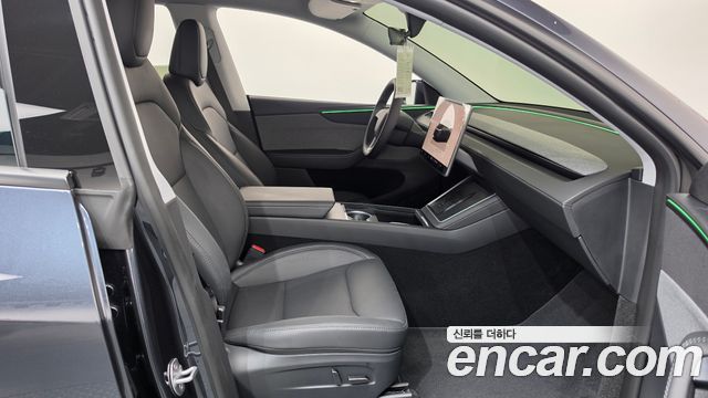 Tesla Model Y 2025 — photo 16