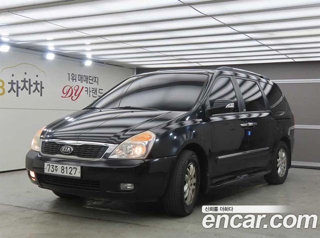 Kia Canival 2013 — photo 1