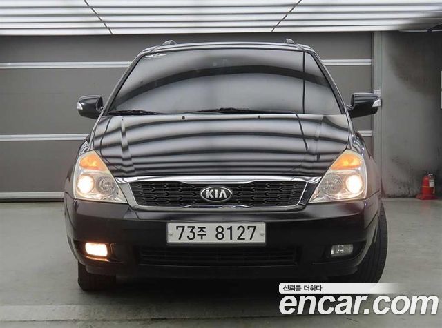 Kia Canival 2013 — photo 2