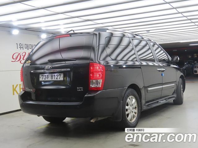 Kia Canival 2013 — photo 4