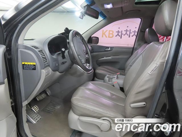 Kia Canival 2013 — photo 5