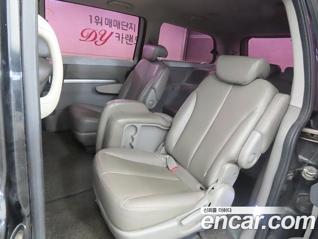 Kia Canival 2013 — photo 7