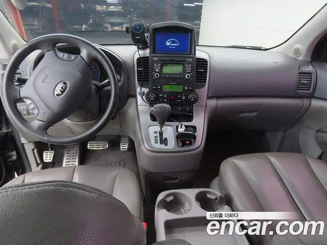 Kia Canival 2013 — photo 8