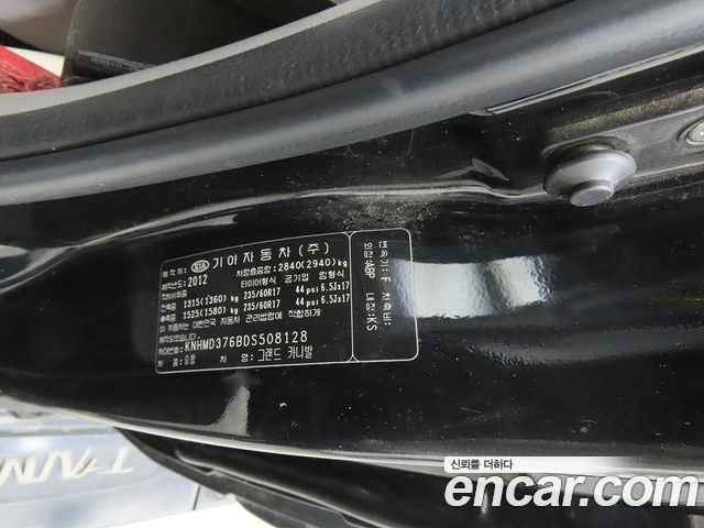Kia Canival 2013 — photo 16