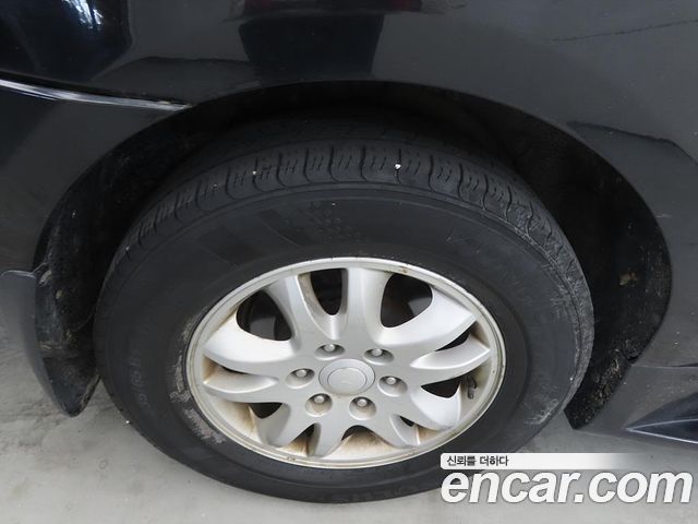 Kia Canival 2013 — photo 20