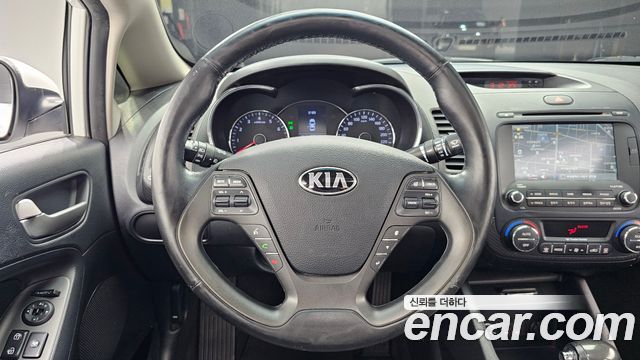 Kia K3 2014 — photo 13