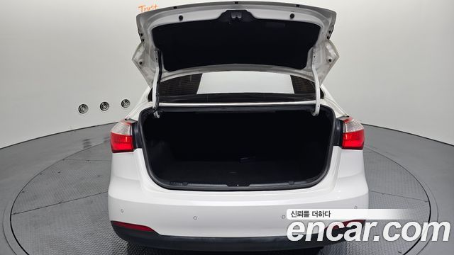 Kia K3 2014 — photo 20