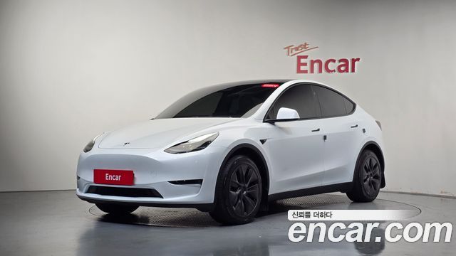 Tesla Model Y 2024 — photo 34