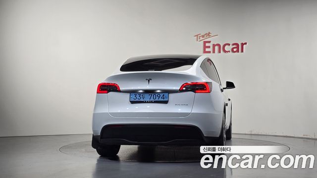 Tesla Model Y 2024 — photo 4