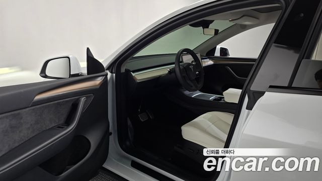 Tesla Model Y 2024 — photo 13