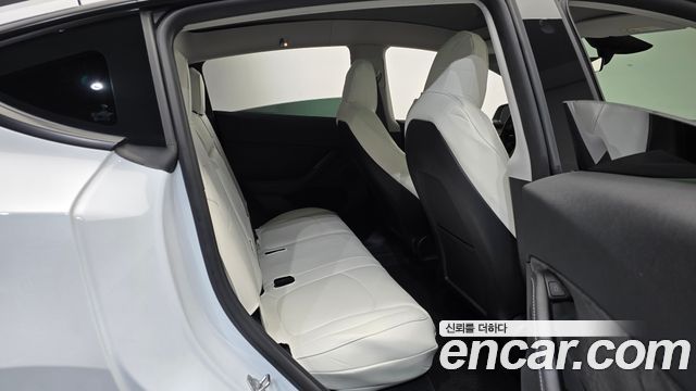 Tesla Model Y 2024 — photo 17