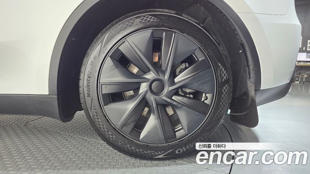 Tesla Model Y 2024 — photo 7