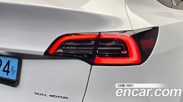 Tesla Model Y 2024 — photo 9