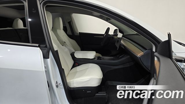 Tesla Model Y 2024 — photo 16