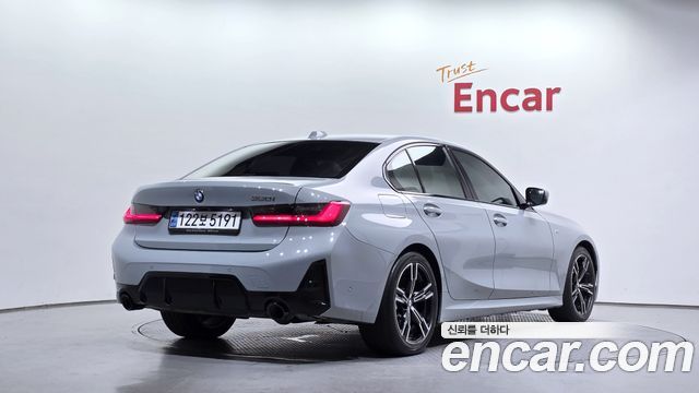 BMW 3-Series 2023 — photo 2