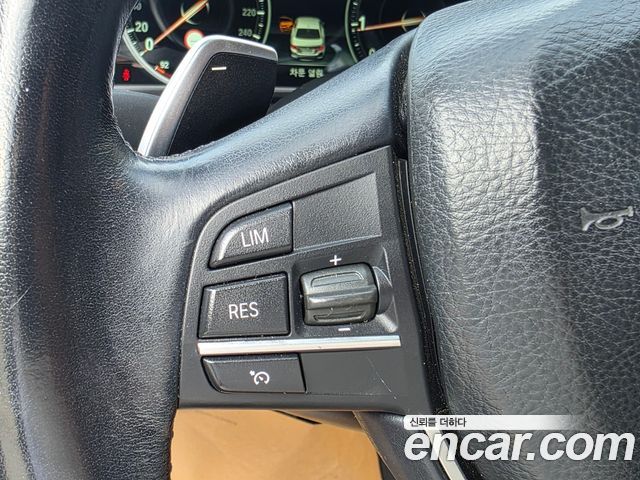 BMW 5-Series 2014 — photo 13