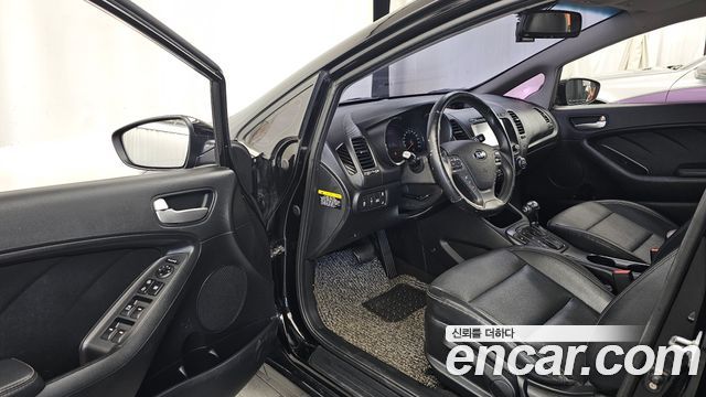 Kia K3 2015 — photo 13