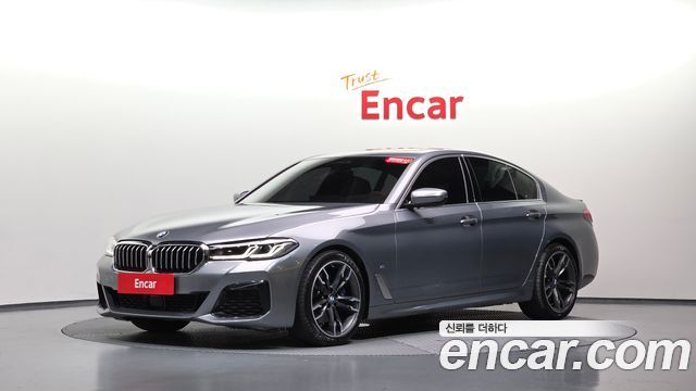 BMW 5-Series 2023 — photo 35