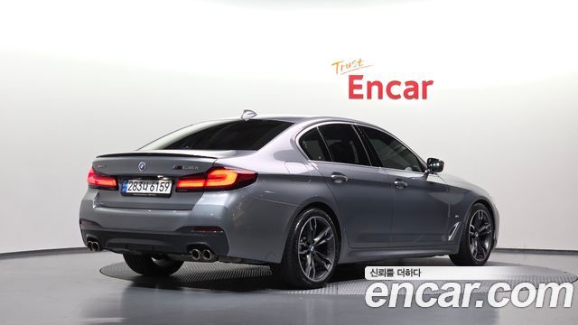 BMW 5-Series 2023 — photo 2