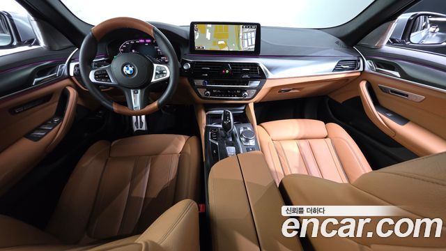 BMW 5-Series 2023 — photo 10