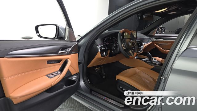 BMW 5-Series 2023 — photo 13