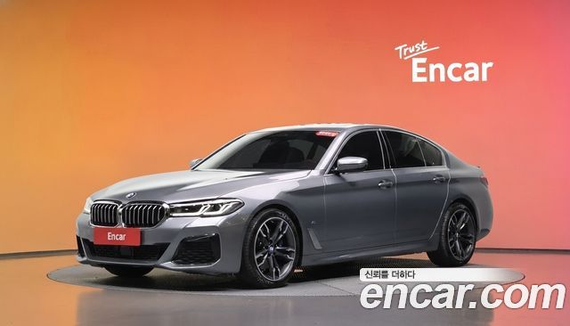 BMW 5-Series 2023 — photo 1