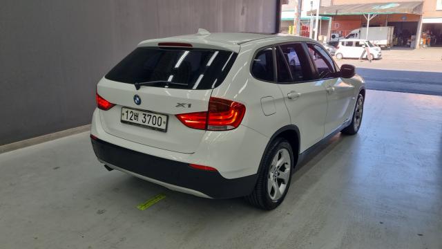BMW X1 2010 — photo 2