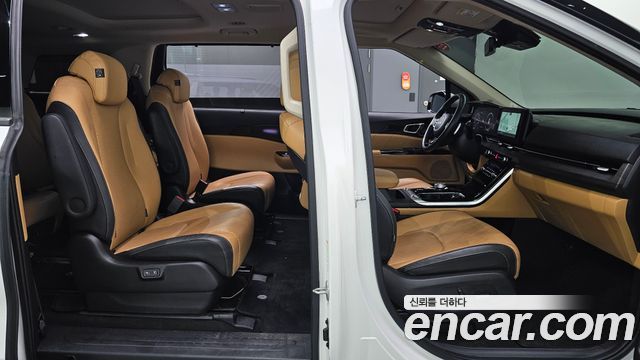 Kia Canival 2023 — photo 16