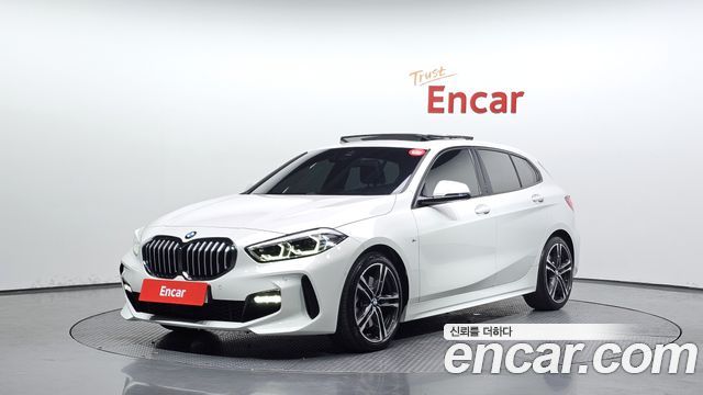 BMW 1-Series 2023 — photo 1