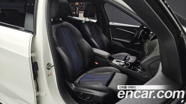 BMW 1-Series 2023 — photo 13