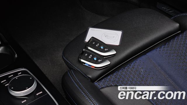 BMW 1-Series 2023 — photo 25