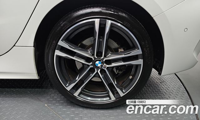 BMW 1-Series 2023 — photo 7