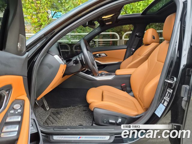 BMW 3-Series 2024 — photo 11