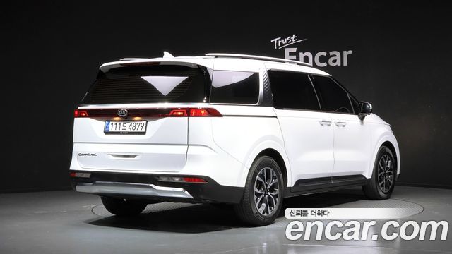 Kia Canival 2021 — photo 2
