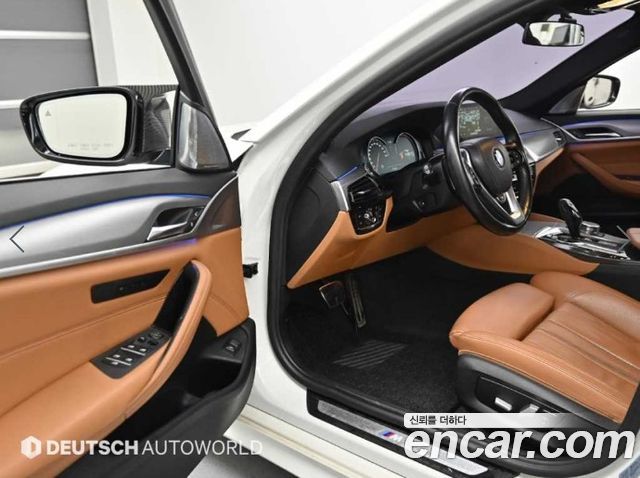 BMW 5-Series 2018 — photo 11