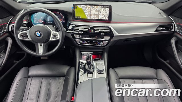 BMW 5-Series 2023 — photo 10