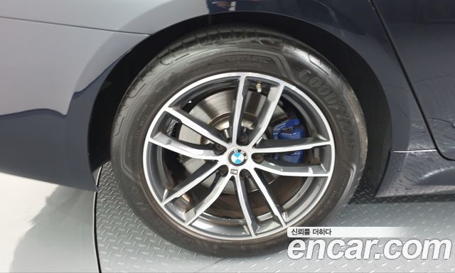 BMW 5-Series 2023 — photo 7