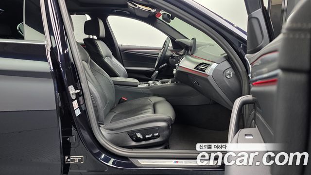 BMW 5-Series 2023 — photo 16