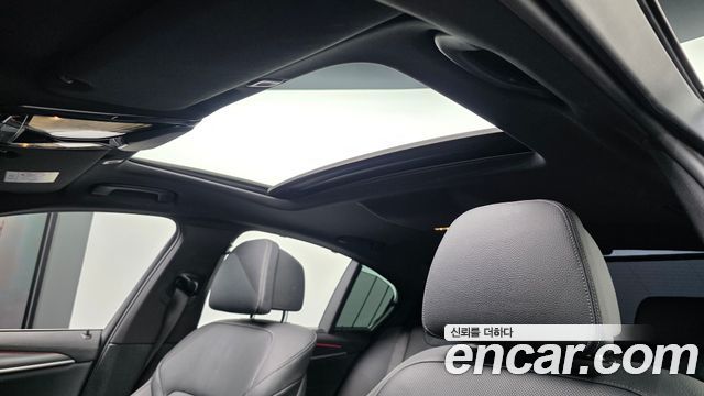 BMW 5-Series 2023 — photo 29
