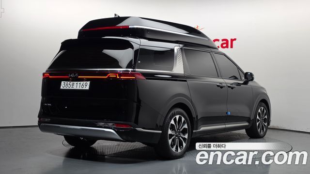 Kia Canival 2023 — photo 2