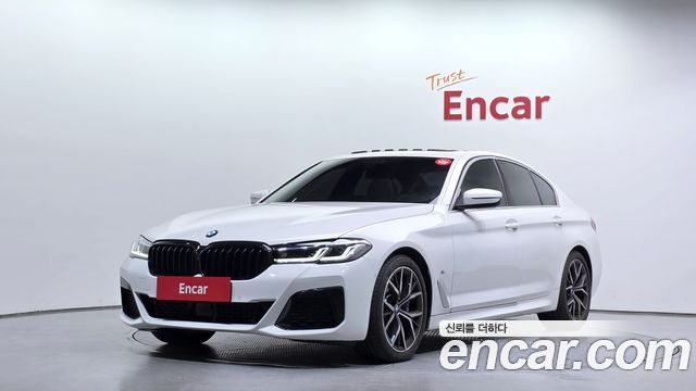 BMW 5-Series 2023 — photo 1
