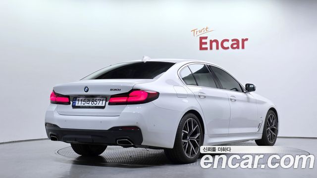 BMW 5-Series 2023 — photo 2