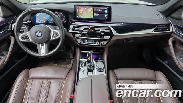 BMW 5-Series 2023 — photo 10
