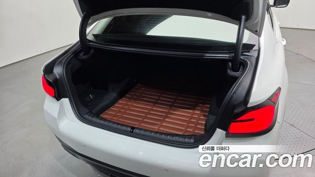 BMW 5-Series 2023 — photo 32