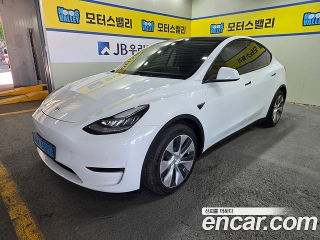 Tesla Model Y 2022 — photo 2