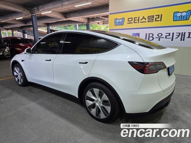 Tesla Model Y 2022 — photo 4