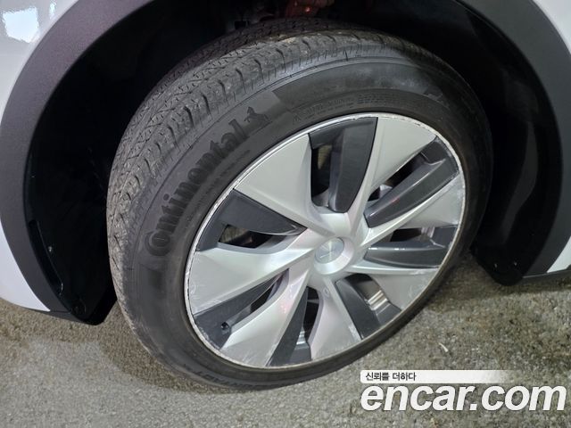 Tesla Model Y 2022 — photo 18